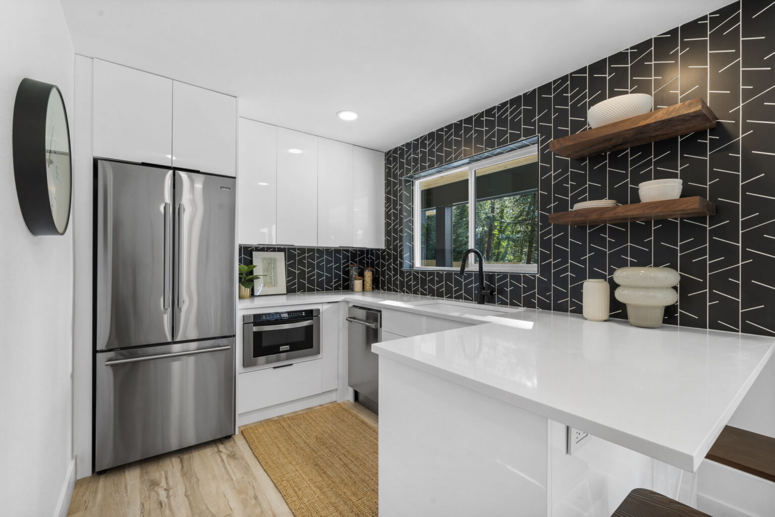 Photograph of beautiful, modern ADU kitchen remodel in Lake Oswego, Oregon by Anchor Vista Homes.
